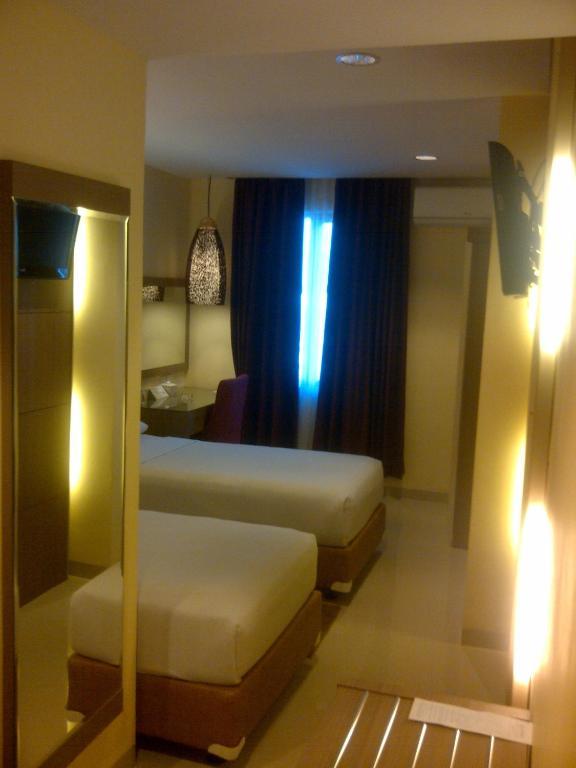 Amans Hotel Ambon Room photo
